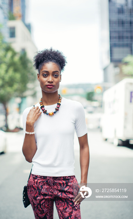 Young woman on city street