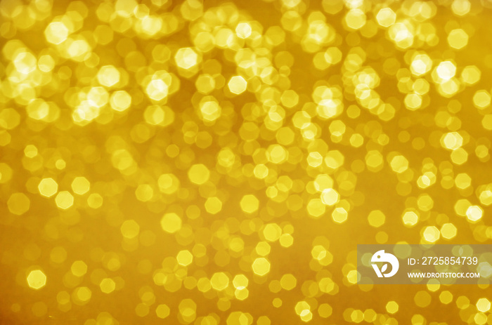 abstract yellow gold bokeh bright glitter sparkle glowing background. for template web advertising d