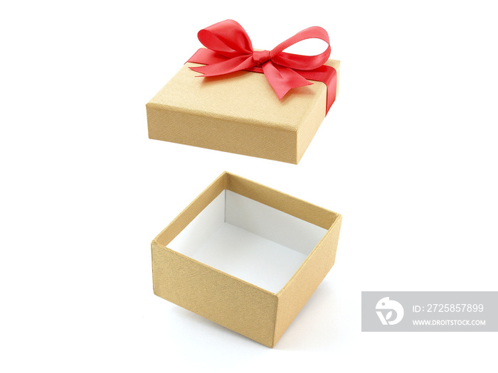 single open empty beige gold gift box with red ribbon bow (lid is floating in the air) isolated on w