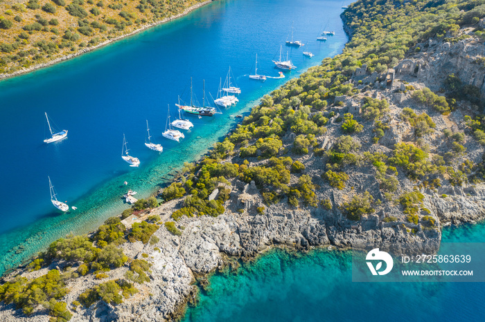 aerial view to peniscola and narrow straight with yachts