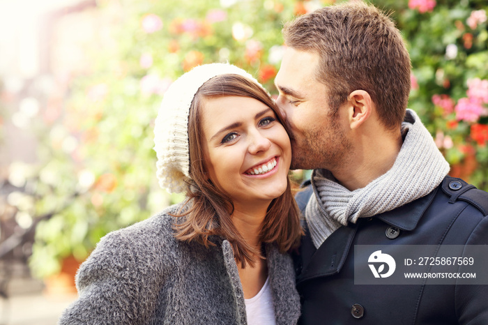 Young couple kissing in the city