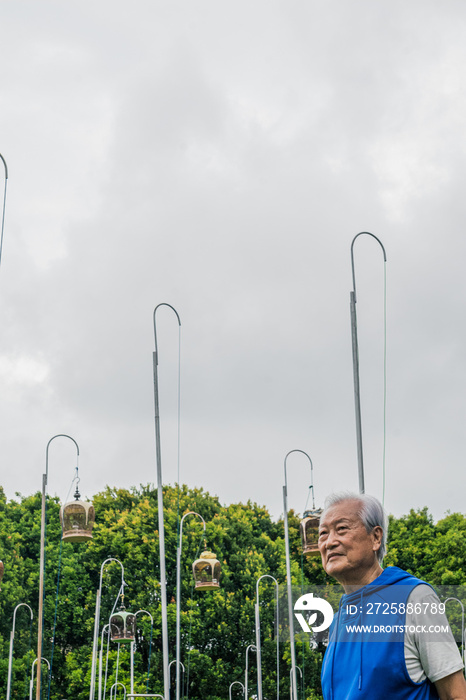 An active aging elderly who is a bird collector