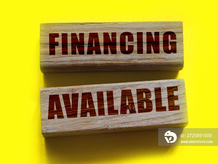 Financing available words on wooden blocks. Business sponsorship concept