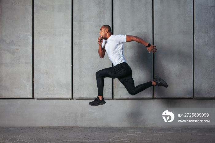 Athletic young man running