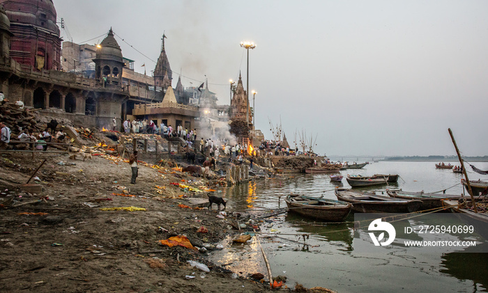 Hindu cremation ceremony at Manikarnika Ghat on banks of holy Ganges river at Varanasi Uttar Pradesh