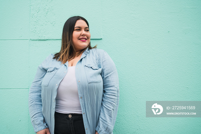 Portrait of young plus size woman.