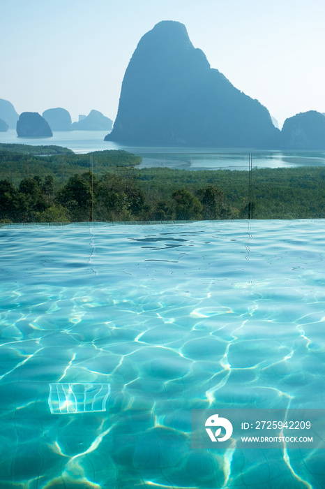 luxury pool hotel against Phang Nga bay background, Tourist relaxing at Samet Nang She, near Phuket 