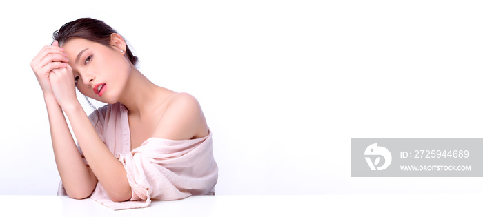 Portrait of beautiful charming young Asian woman posing facial and sitting with white table, beauty 