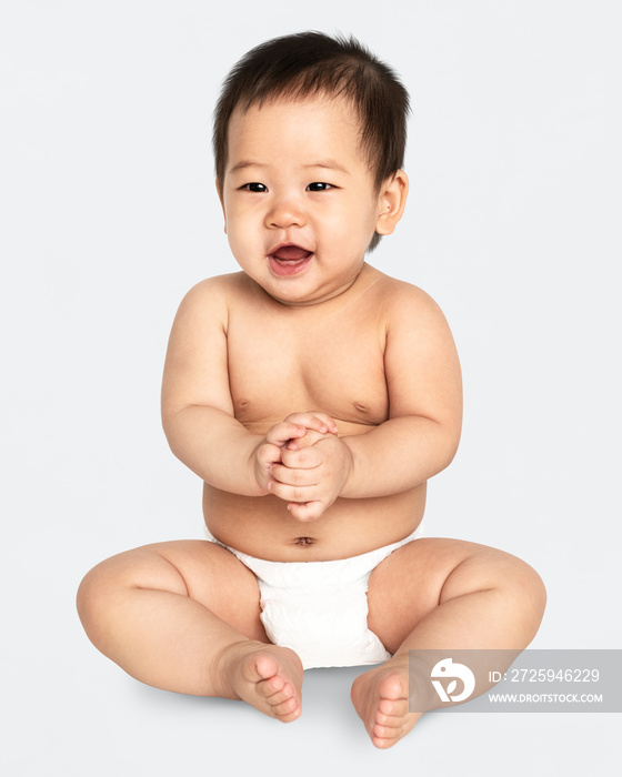 Cheerful baby in a studio