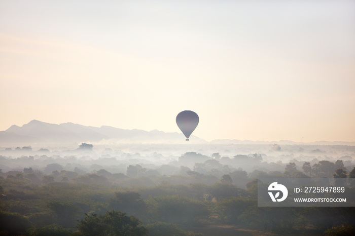 Hot air balloons fly over Bagan