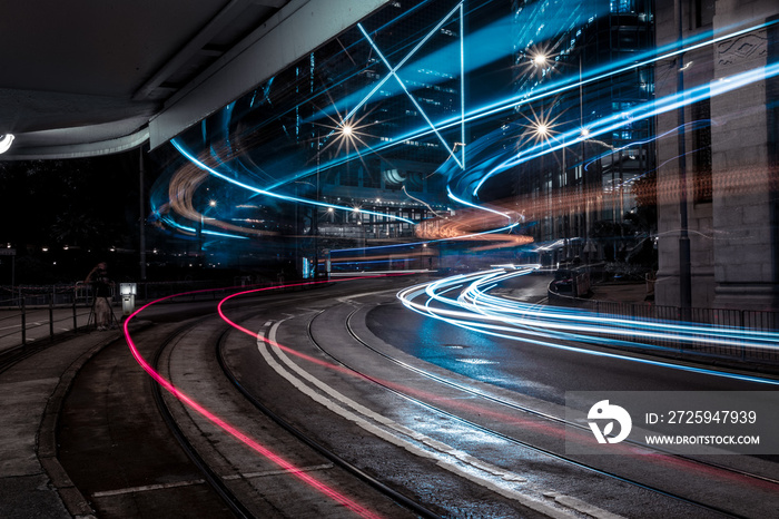 fast-moving train in the street producing light streaks