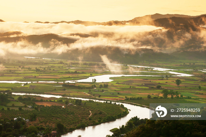 Scenery valley with Kok River in the morning mist.