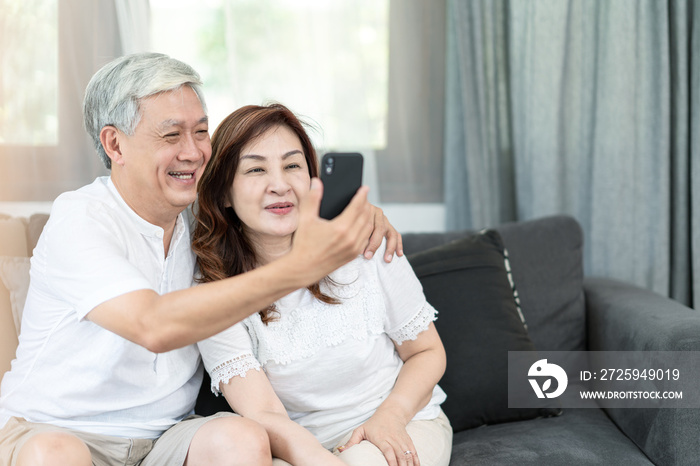 Candid of attractive old asian couple husband and wife us technology for video call via smartphone 5