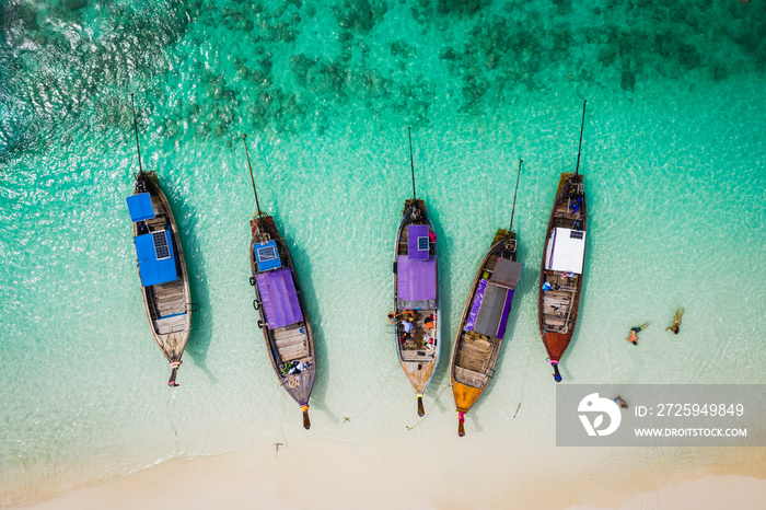 hi season boat and tourists on phiphi island Krabi Thailand aerial view from drone