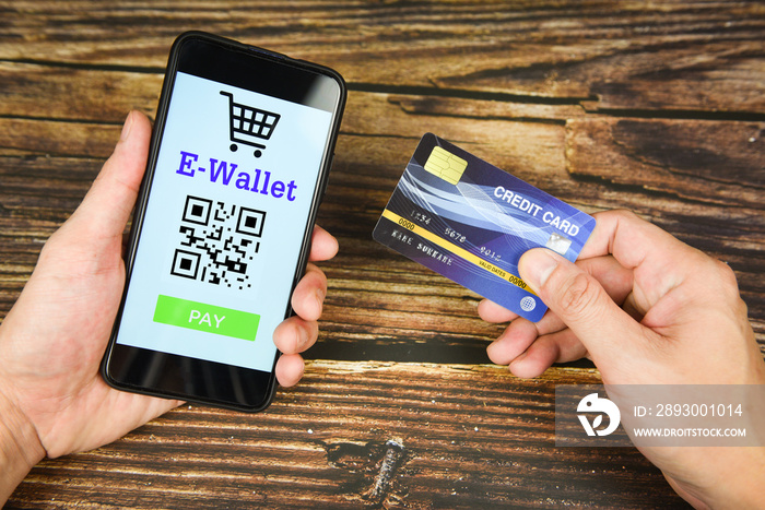 hand holding credit card and e wallet app on smartphone technology pay - payment online shopping pay