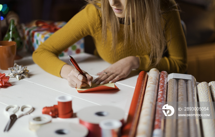 Woman writing a Christmas card