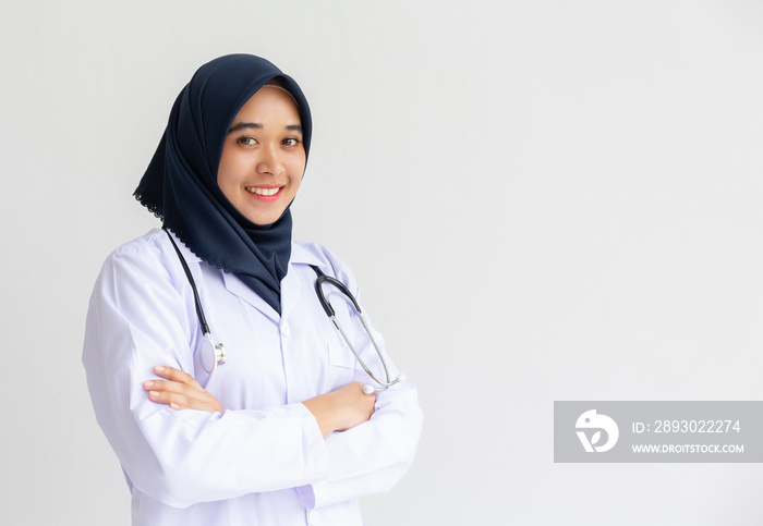 Young Arab Muslim intern doctor women smile on isolate white background concept for Islam people wor