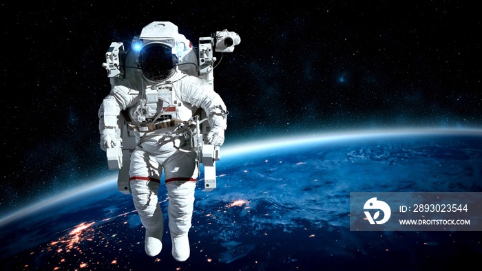 Astronaut spaceman do spacewalk while working for spaceflight mission at space station . Astronaut w