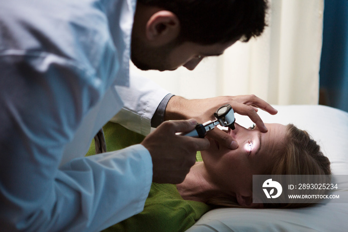 Doctor doing medical examination on patient