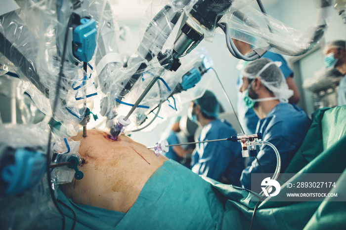 Surgical room in hospital with robotic technology equipment, machine arm surgeon in futuristic opera