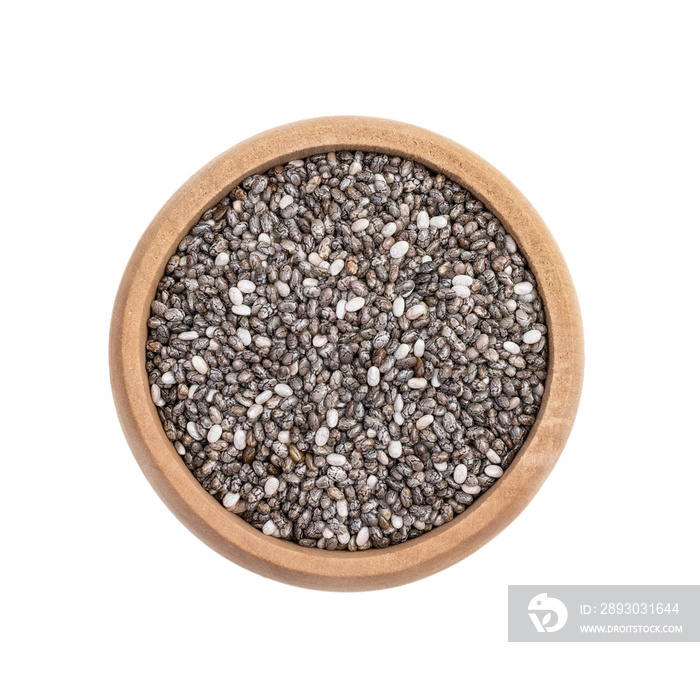 Small wooden bowl with chia seeds seen directly from above and isolated on white background