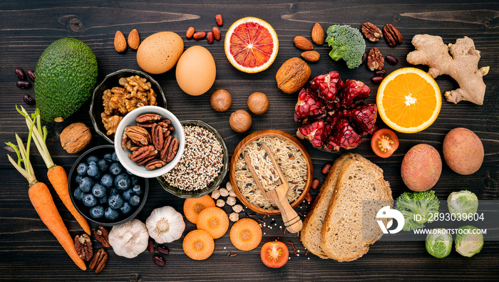 Ingredients for the healthy foods selection. The concept of healthy food set up on wooden background