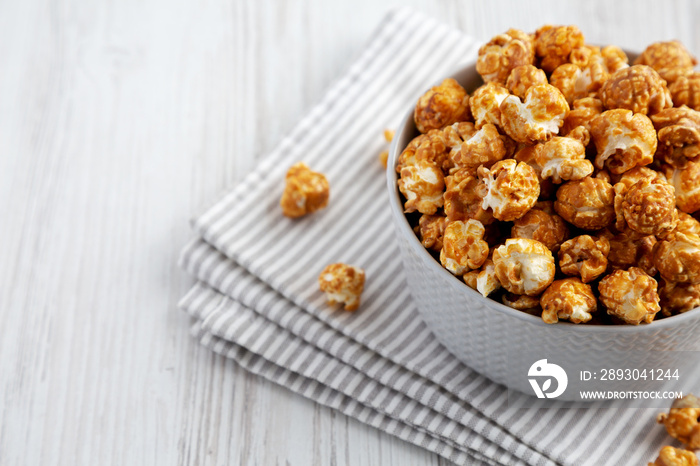 Homemade Caramel Popcorn in a gray Bowl, low angle view. Space for text.