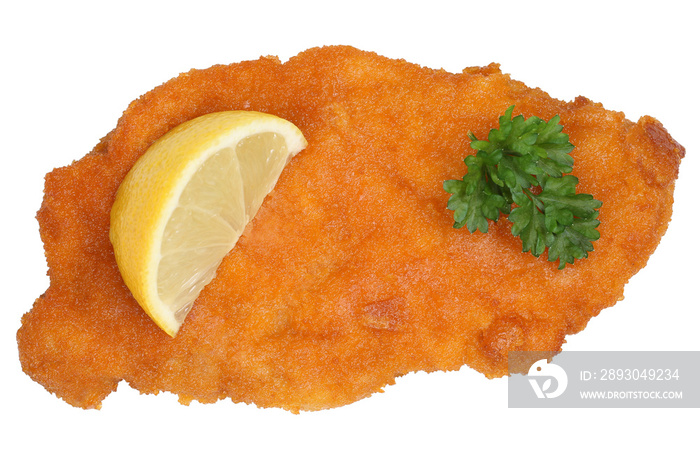 Paniertes Wiener Schnitzel mit Zitrone isoliert