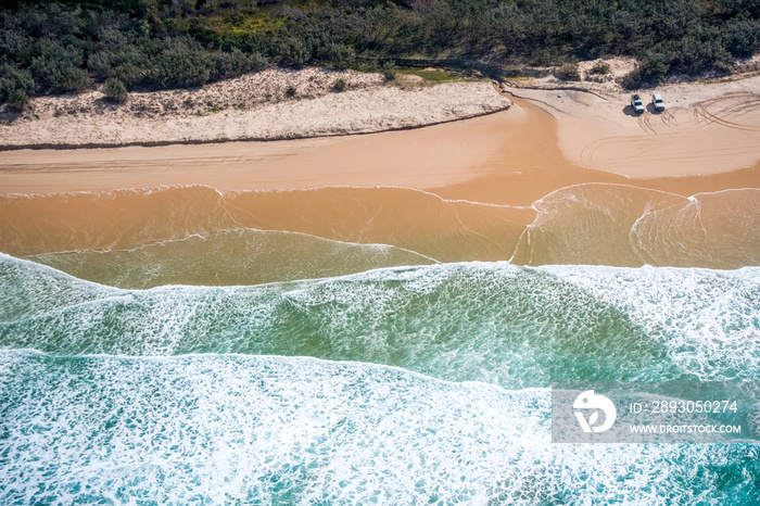 4wd cars on beach highway on Fraser Island, Queensland, australia