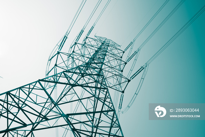 Abstract pattern from bottom view of high voltage pole power transmission tower with clear sky sunny