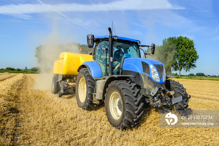 Mechanized picking straw and square baling from close