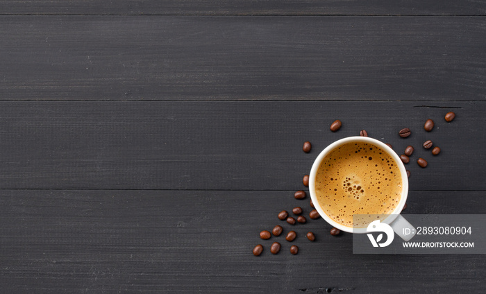 hot coffee and bean on wooden background. top view