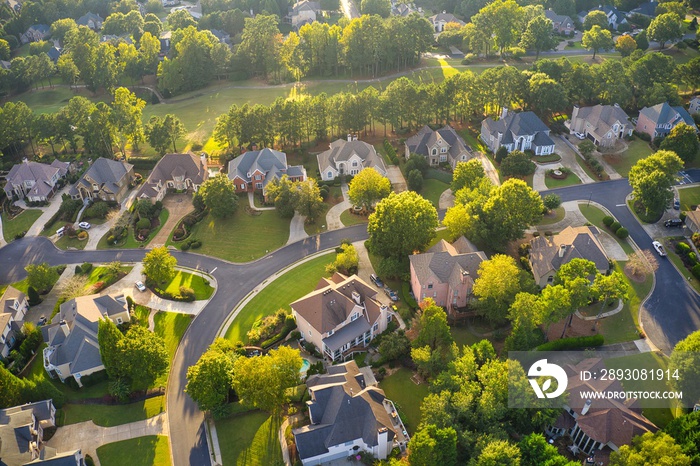 Aerial view of an upscale subdivision in suburbs of a city in USA