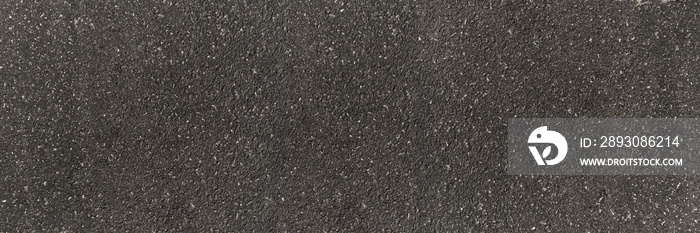 全景黑色沥青路面纹理和背景。沥青路面上的水平柏油路面灰色颗粒。