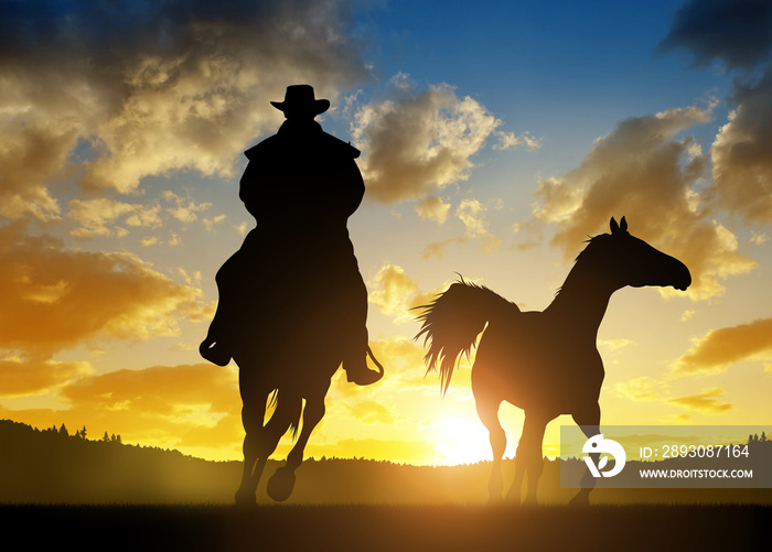 Silhouette cowboy with horse at sunset