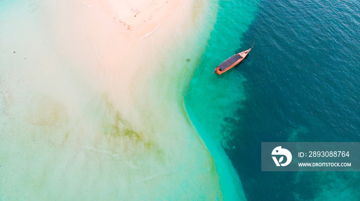 Boat in the Indian Ocean turquoise waters