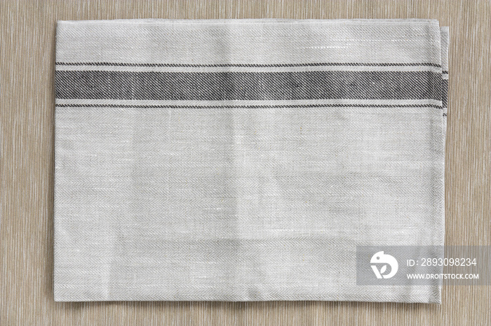 俯视图空白灰色餐垫（餐巾）或棕色毛巾