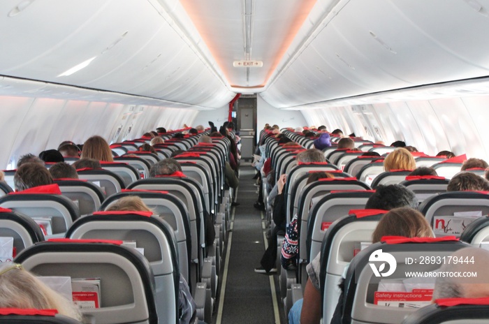 冠状病毒飞机飞机旅行禁令停飞概念飞机客舱飞机座位人飞机