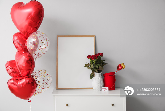 Gift for Valentines Day, flowers and balloons in interior of room