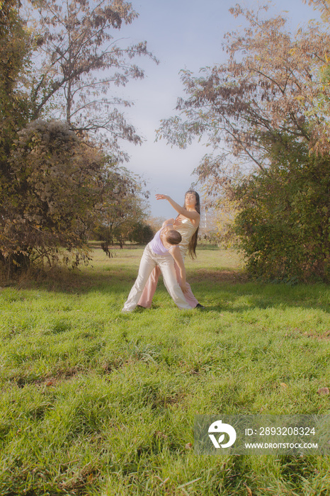 women in nature dancing