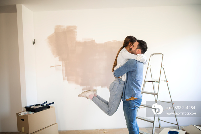 Happy couple moving-in.