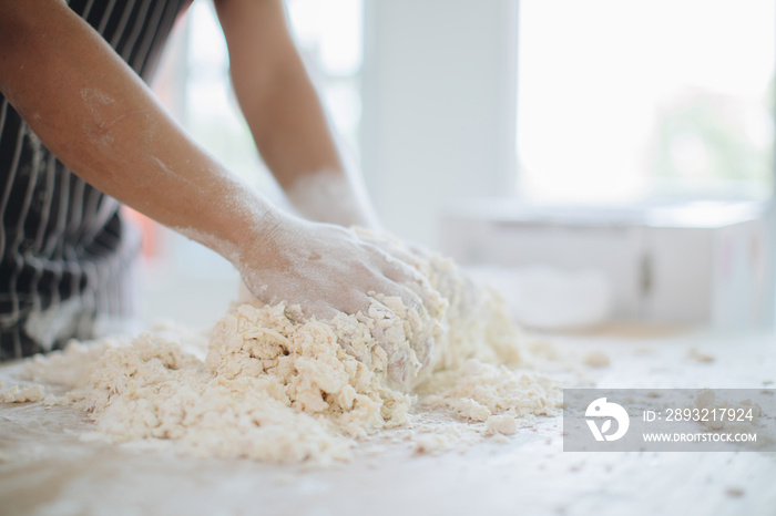 Making Handmade Noodles on wood background