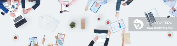 Business people sitting and discussing at business meeting, in office