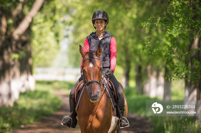 Young woman on a horse ride