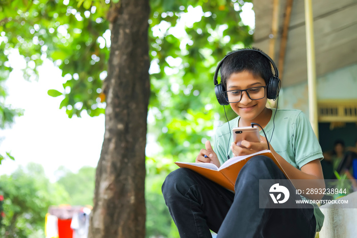 indian child attending online lecture