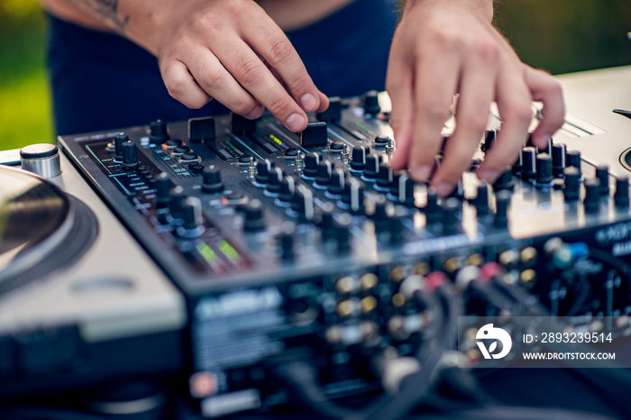 Dj mixing outdoor at beach party