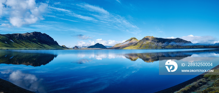 panoramic picture of Alftavatn Lake coast with mountain reflection at the sunrise, Iceland. big pano