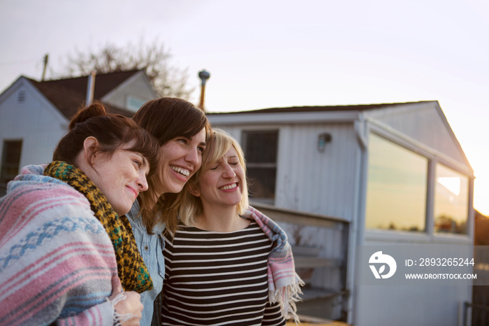 View of mid adult women laughing