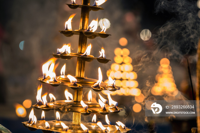 Candles used in performance of religious Ganga Aarti ritual fire puja at Dashashwamedh Ghat in Varan