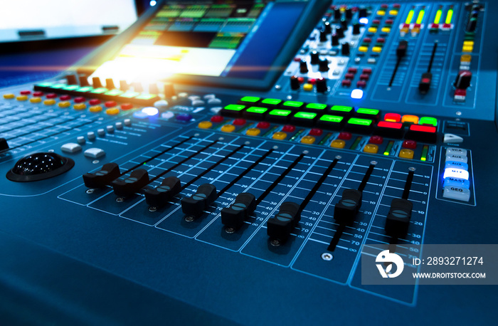 Professional audio studio sound mixer console board panel with recording , faders and adjusting knob